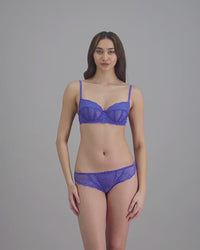 model-poses-in-dazzling-blue-lingerie-set