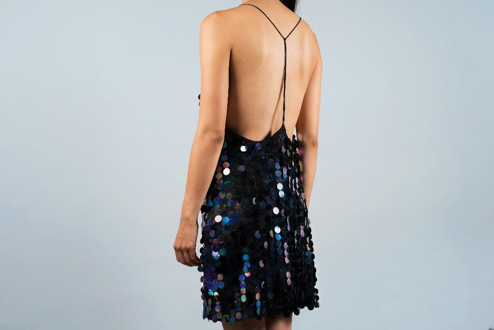back-of-woman-wearing-sequin-cocktail-dress